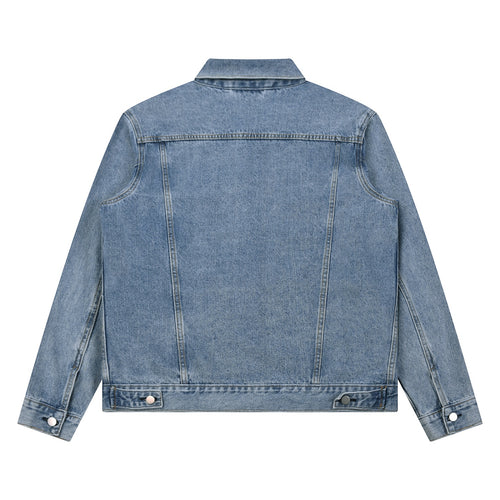 Back view of Anointed Garments classic medium-blue denim jacket with a point collar and reinforced stitching.