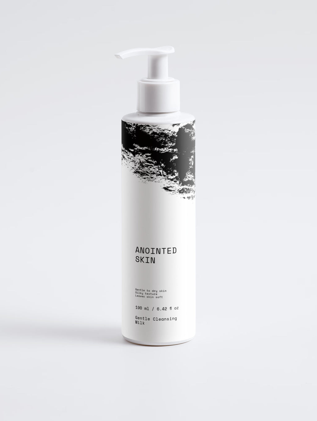 Anointed Garments Anointed Skin Silky Soft Cleansing Milk in a white pump bottle with black abstract graphic design.