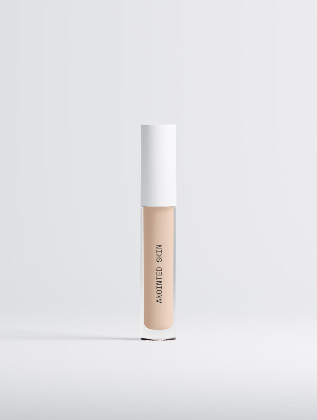 Anointed Garments Anointed Skin Correcting Concealer in 05 Light Cool with a white cap and clear tube packaging.