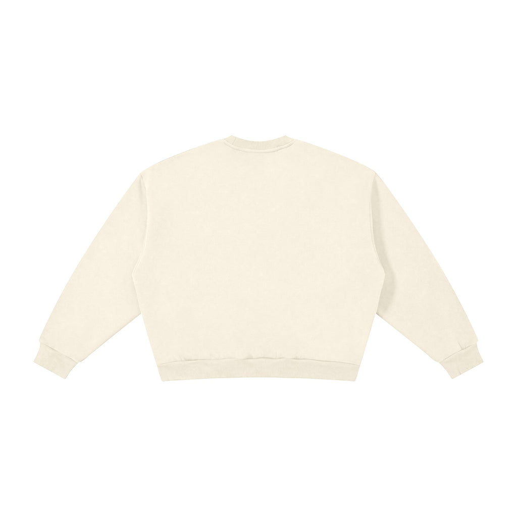 Anointed Garments essential crewneck sweatshirt in cream featuring a relaxed fit, drop shoulders, and ribbed trim.