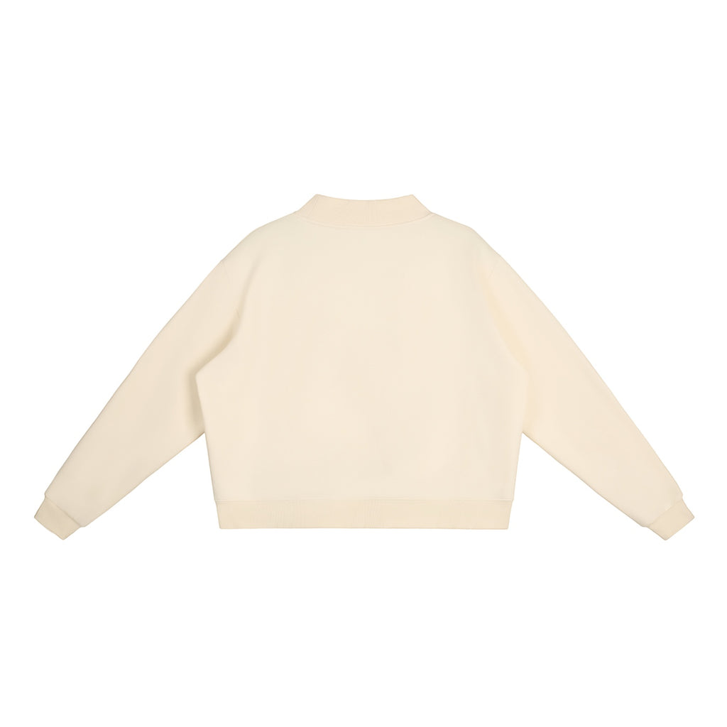 Back view of an Anointed Garments cream oversized mock-neck fleece sweatshirt with drop shoulders.