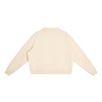 Back view of an Anointed Garments cream oversized mock-neck fleece sweatshirt with drop shoulders.