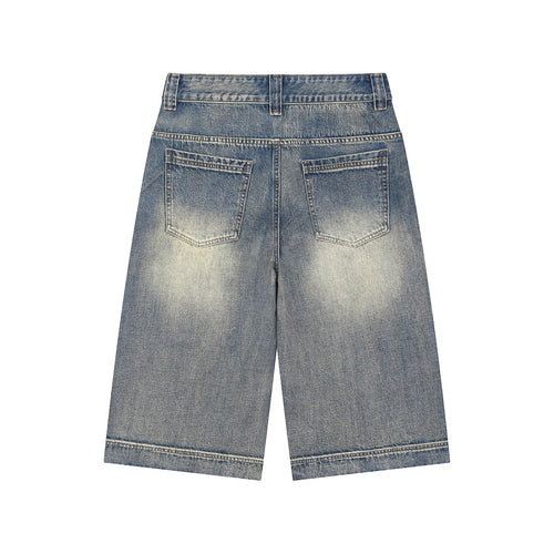 Anointed Garments medium-wash denim Bermuda shorts with a relaxed wide-leg fit, back pockets, and vintage fading.