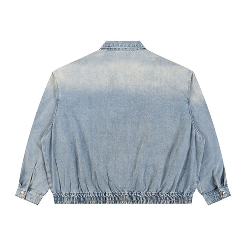 Back view of Anointed Garments light acid-wash denim bomber jacket with elasticated hem and cuffs