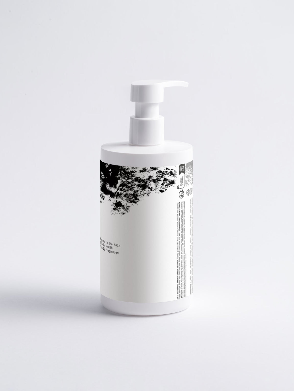 Anointed Garments Gloss & Volume Shampoo in a white pump bottle for smooth, glossy, and full-bodied hair.