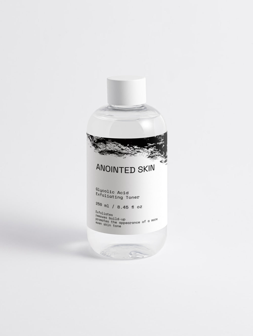 Anointed Garments Anointed Skin 5% Glycolic Acid liquid exfoliator toner in a clear bottle with a white cap.