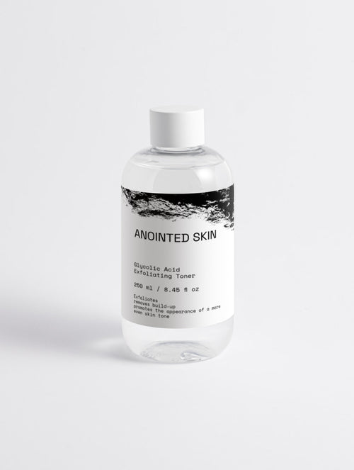 Anointed Garments Glycolic Acid Exfoliating Toner in a clear 250ml bottle with a minimalist white and black label.