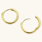 Anointed Garments 14K gold-plated 925 sterling silver hoop earrings with a polished 19 mm circular design.