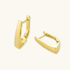 Anointed Garments Golden Hour huggie earrings in 14K gold-plated 925 sterling silver with a polished geometric design.