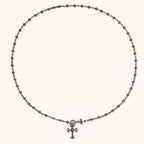 Anointed Garments sterling silver gothic cross necklace with an ornate fleur-de-lis pendant and oxidized floral chain.