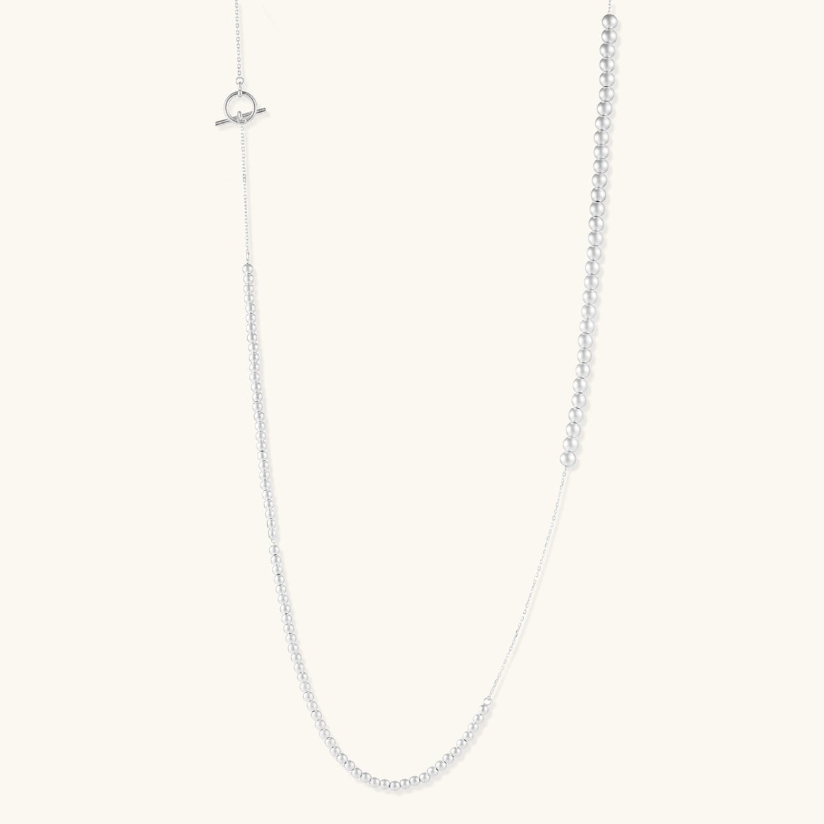 Anointed Garments long sterling silver necklace with graduated polished spheres and a toggle clasp closure.