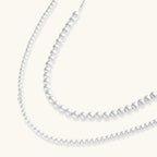 Anointed Garments graduated sterling silver sphere necklace with polished beads ranging from 3.9mm to 6.0mm in size.