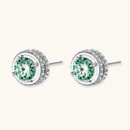 Anointed Garments emerald green round-cut moissanite halo stud earrings in platinum-plated 925 sterling silver.