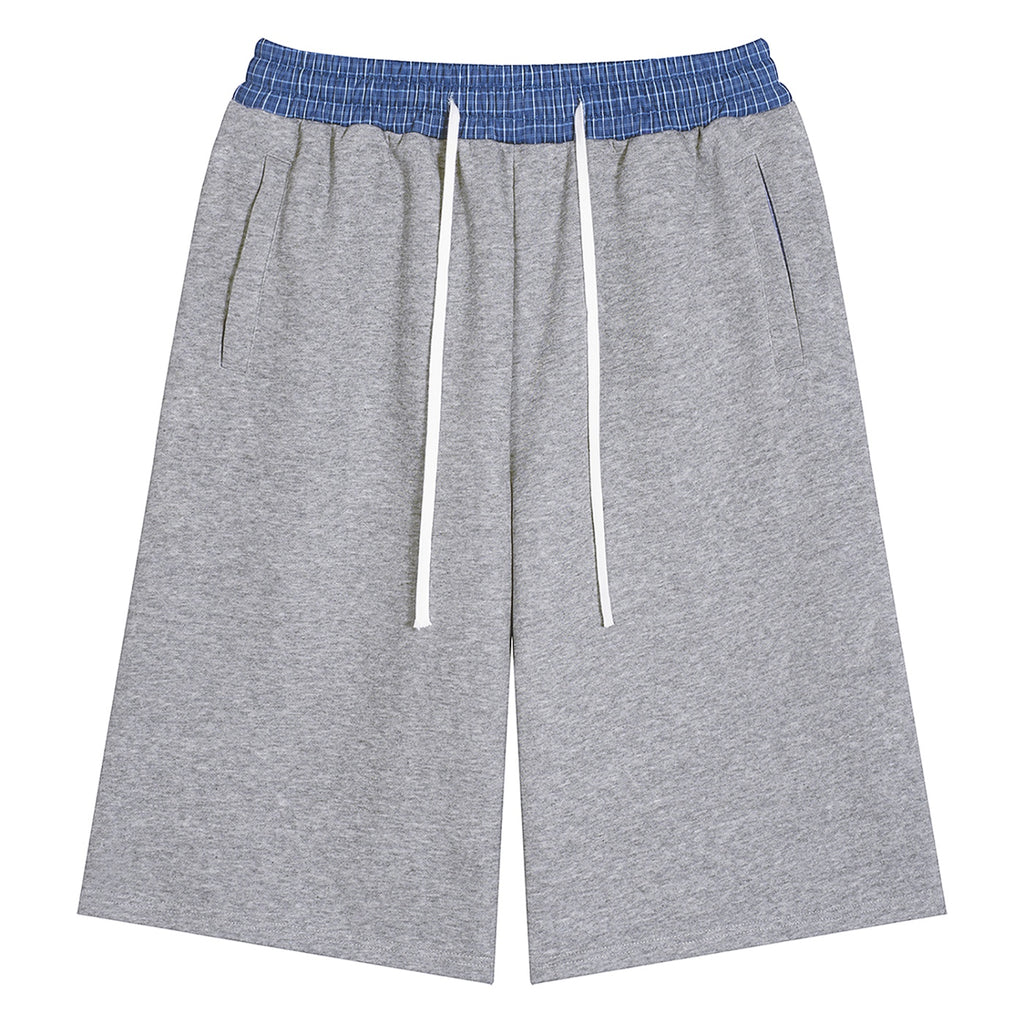 Anointed Garments unisex grey cotton-blend shorts featuring a blue plaid elastic waistband and white drawstring.