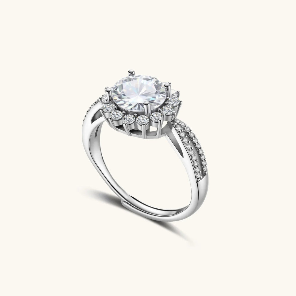 Anointed Garments Stellar Halo moissanite ring in platinum-plated sterling silver with a round-cut 2-carat center stone.