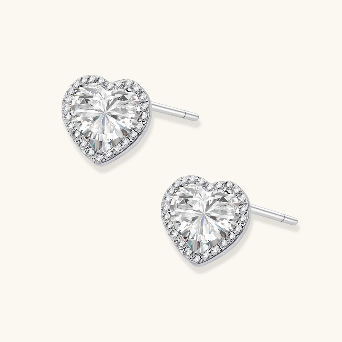 Anointed Garments heart-shaped moissanite stud earrings in platinum-plated 925 sterling silver with a halo setting.