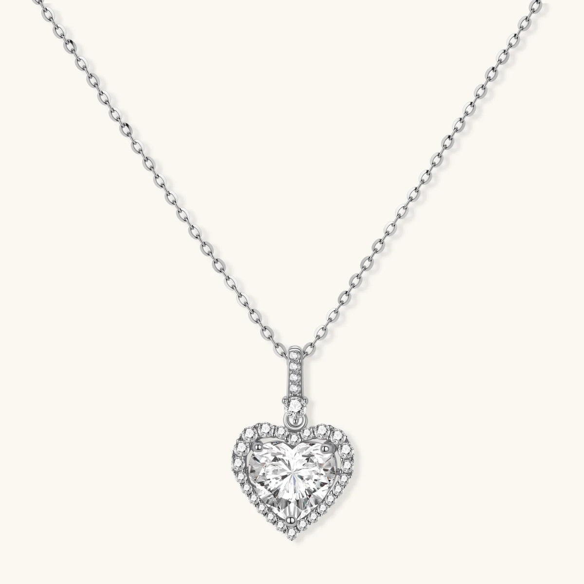 Anointed Garments heart-shaped moissanite pendant necklace in platinum-plated 925 sterling silver with a delicate chain.