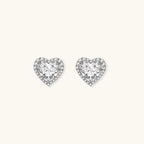 Anointed Garments heart-shaped moissanite stud earrings in platinum-plated sterling silver with round-cut stones.