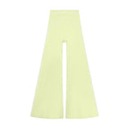 Anointed Garments high-rise flared yoga pants in light yellow with white piping detail, made from stretch fabric.