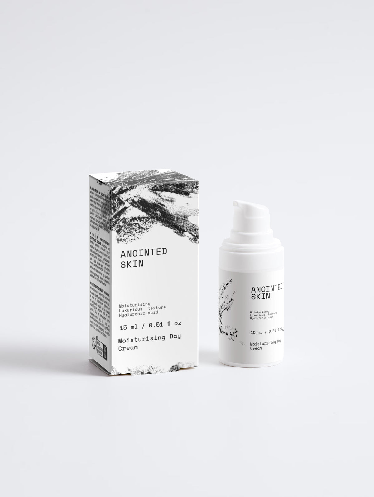 Anointed Garments Anointed Skin Hyaluronic Dew Cream in white pump bottle and matching box with black artistic print.