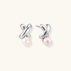 Anointed Garments Infinity Pearl Studs featuring sculptural rhodium-plated sterling silver twists and freshwater pearls.