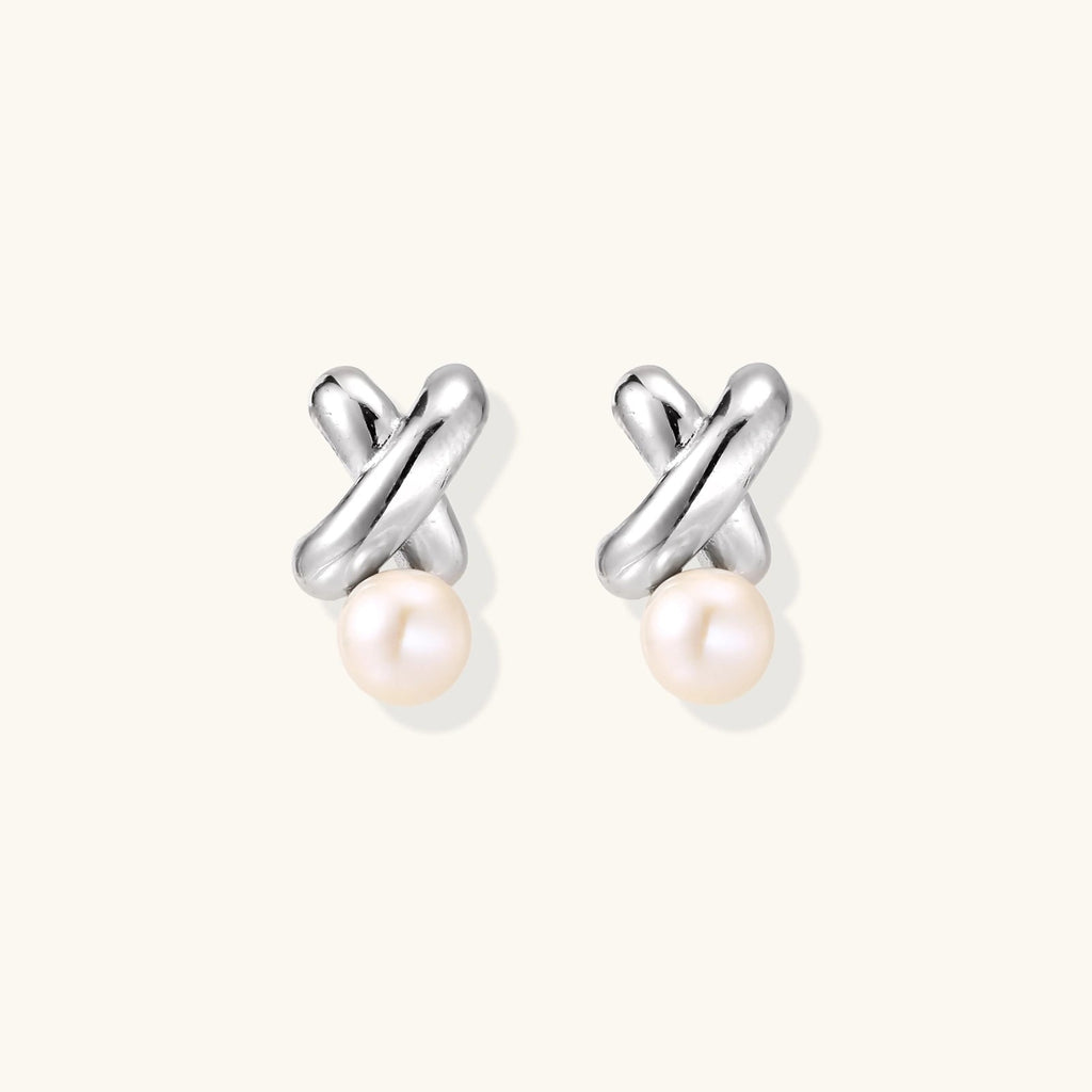 Anointed Garments Infinity Pearl Studs featuring sculptural rhodium-plated sterling silver twists and freshwater pearls.