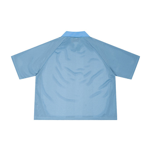 Back view of Anointed Garments light blue mesh polo shirt with raglan sleeves and a relaxed boxy fit