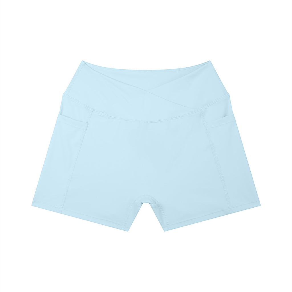 Anointed Garments light blue high-rise yoga shorts with side pockets and a flattering crossover waistband design.