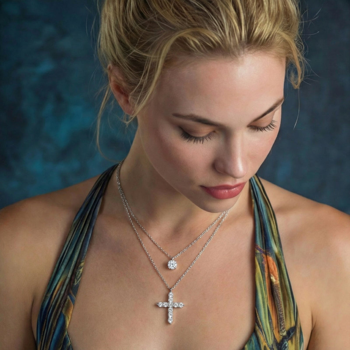 Anointed Garments Faith & Light Layered Set featuring a round moissanite pendant and a cross necklace in silver.
