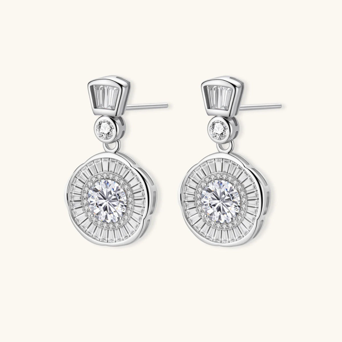 Anointed Garments celestial sunburst drop earrings in platinum-plated sterling silver with round-cut moissanite stones.