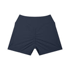 Anointed Garments high-waisted athletic shorts in dark navy with a ruched back and side pockets for performance.