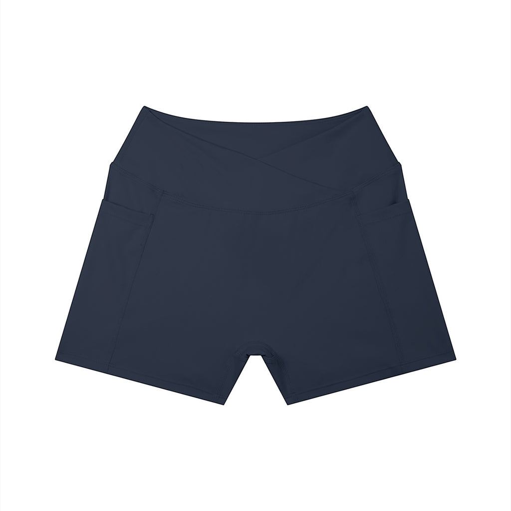 Anointed Garments high-rise yoga shorts in navy blue featuring a crossover waistband and side pockets.
