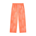 Anointed Garments unisex sunfade wide leg fleece sweatpants in bright orange with an elastic drawstring waist.