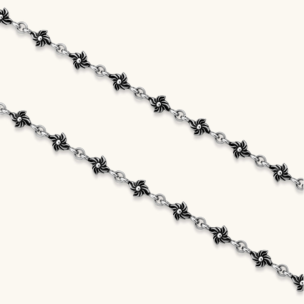 Anointed Garments sterling silver necklace chain with intricate oxidized floral links in a gothic style.