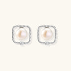 Anointed Garments Pearl Halo Studs featuring round freshwater pearls in square rhodium-plated sterling silver settings.