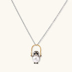 Anointed Garments Wise Penguin Pearl Necklace featuring a sterling silver penguin pendant holding a freshwater pearl.