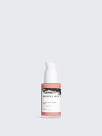 Anointed Garments Anointed Skin peptide anti-aging serum in a peach-colored bottle with a white pump dispenser