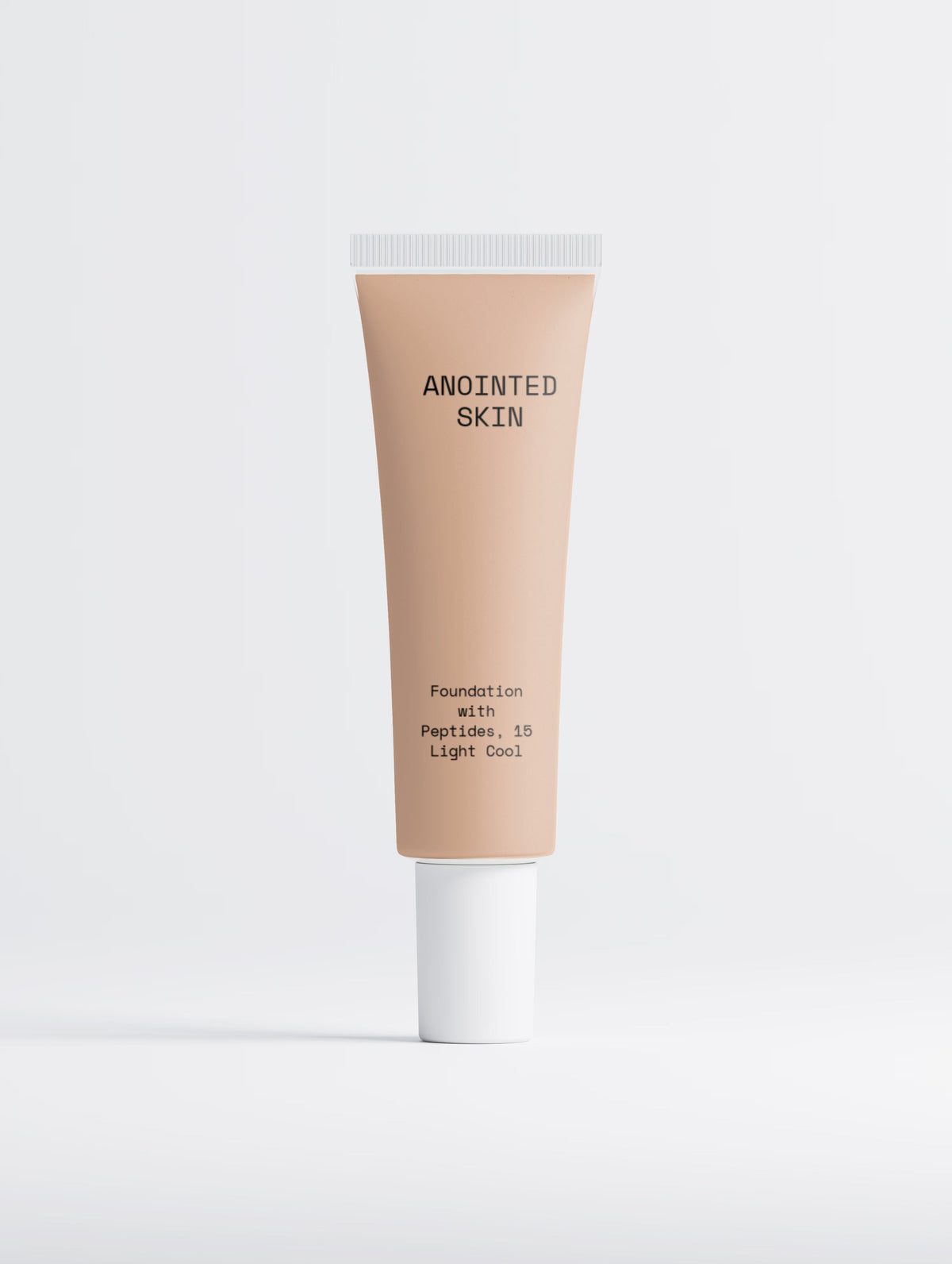Anointed Garments Anointed Skin Peptide Foundation in 15 Light Cool, a lightweight liquid makeup in a squeeze tube.