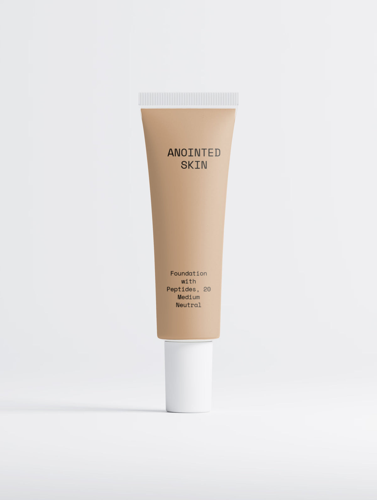 Anointed Garments Anointed Skin peptide foundation in 20 Medium Neutral shade in a beige squeeze tube.