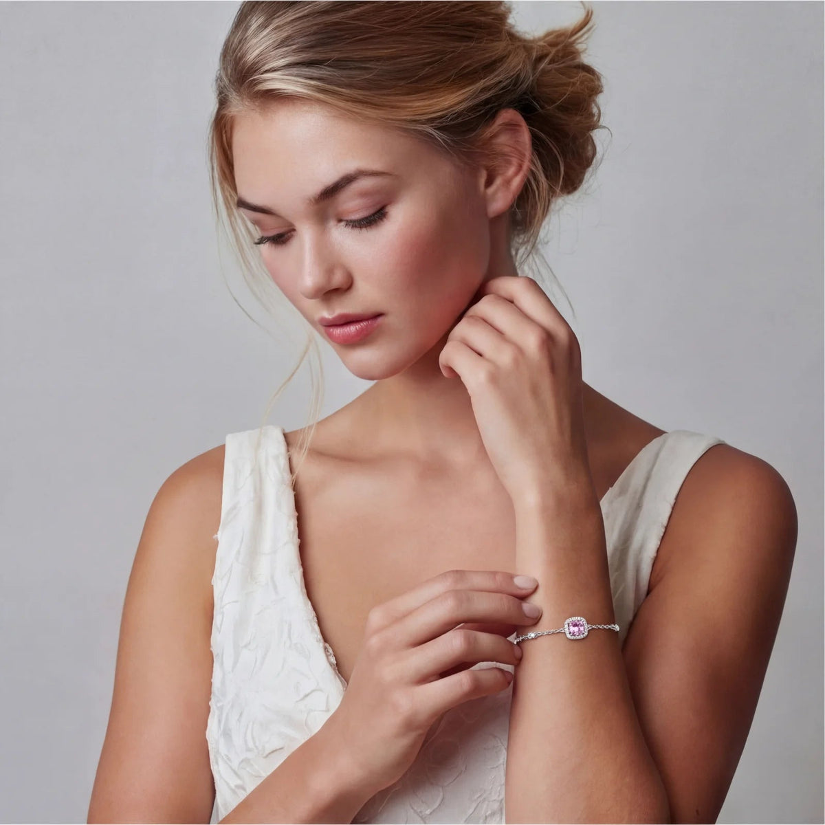Anointed Garments Blush Dreams bracelet featuring a pink moissanite cushion centerpiece in 925 sterling silver on model