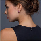 Anointed Garments Blush Dreams moissanite stud earring in pink with a platinum-plated sterling silver halo setting.