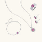 Anointed Garments Blush Dreams four-piece jewelry set featuring pink moissanite stones set in platinum-plated silver.