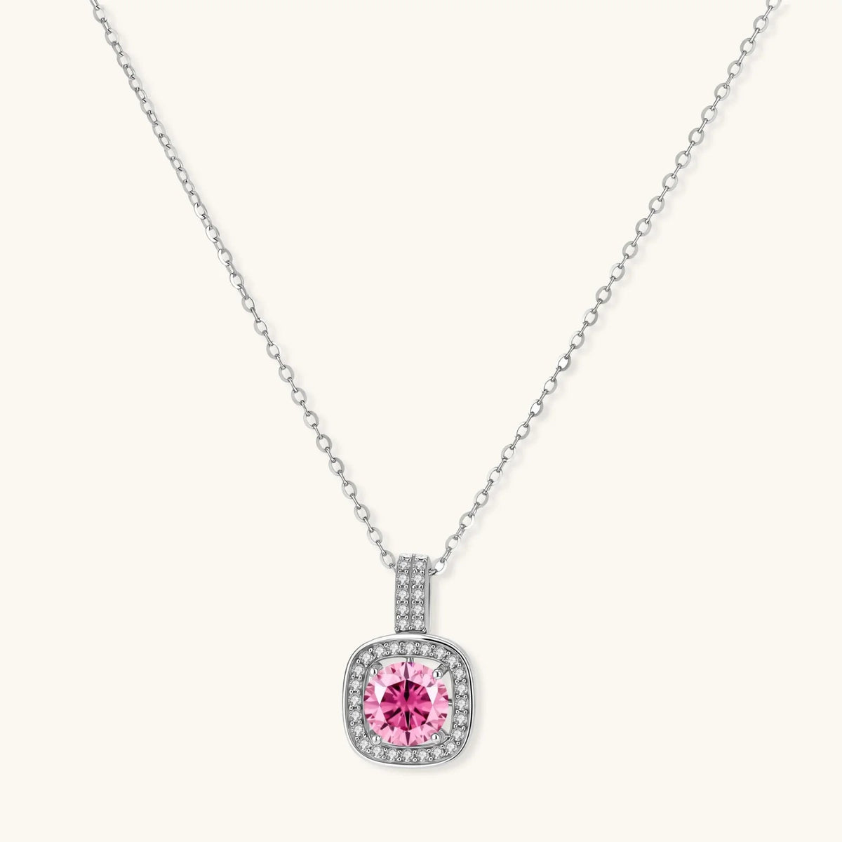 Anointed Garments pink moissanite pendant necklace in platinum-plated 925 sterling silver with a round center stone.