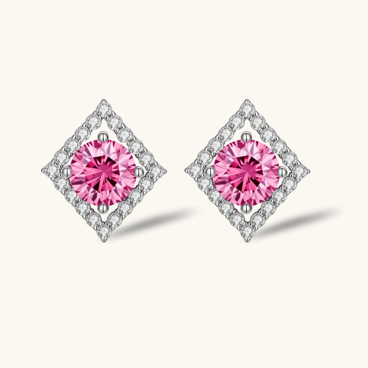 Anointed Garments pink moissanite stud earrings featuring round-cut stones in geometric platinum-plated silver settings.