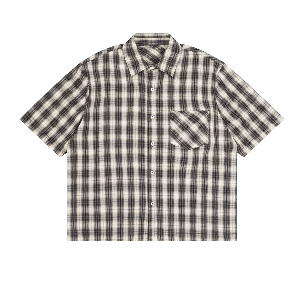 Anointed Garments unisex short sleeve button-up shirt in a casual black and white plaid pattern with a chest pocket.
