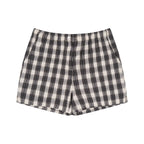 Anointed Garments unisex plaid shorts in black and white with an elastic waist, button detail, and side pockets.