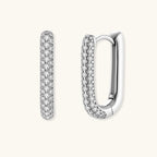 Anointed Garments platinum-plated sterling silver huggie hoops with pavé-set crystals in a sleek rectangular design.