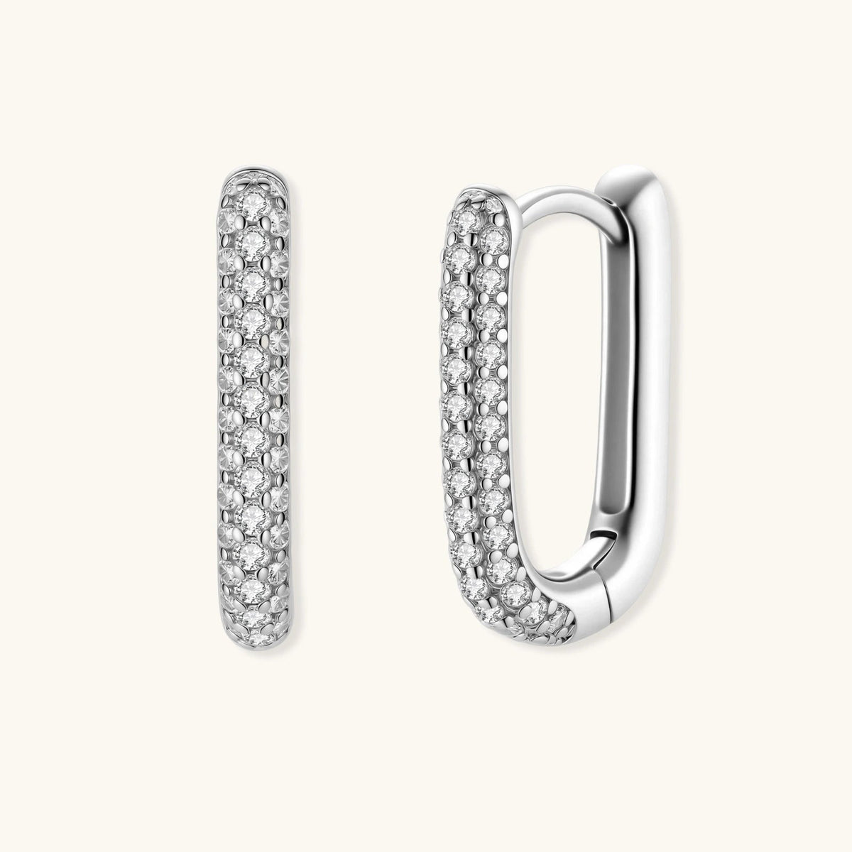 Anointed Garments platinum-plated sterling silver huggie hoops with pavé-set crystals in a sleek rectangular design.