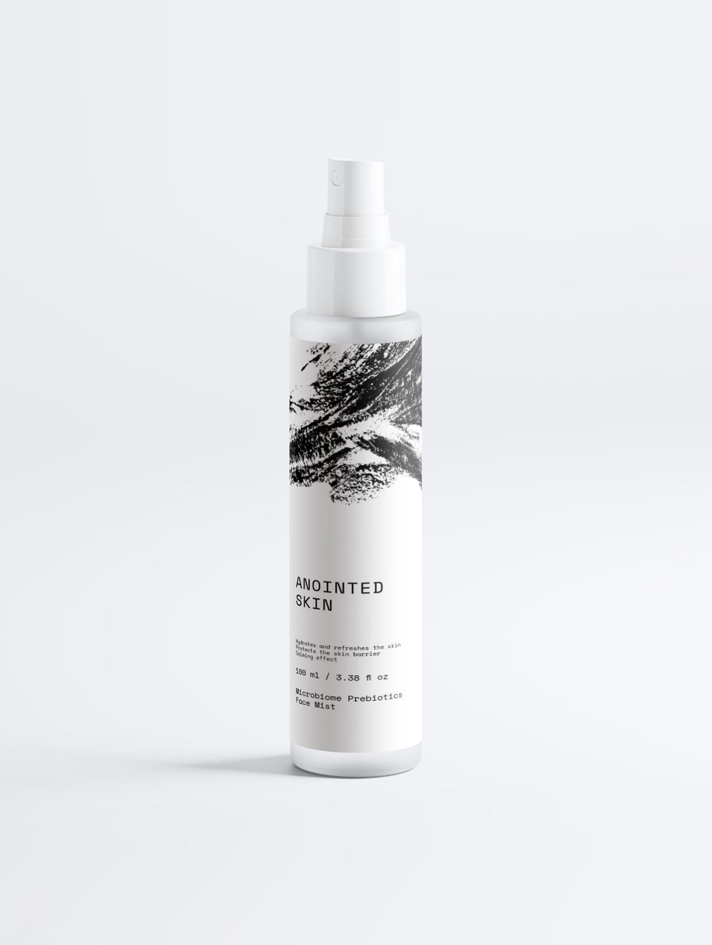 Anointed Garments Anointed Skin Prebiotic Hydrating Face Mist in a white spray bottle with black brushstroke design.