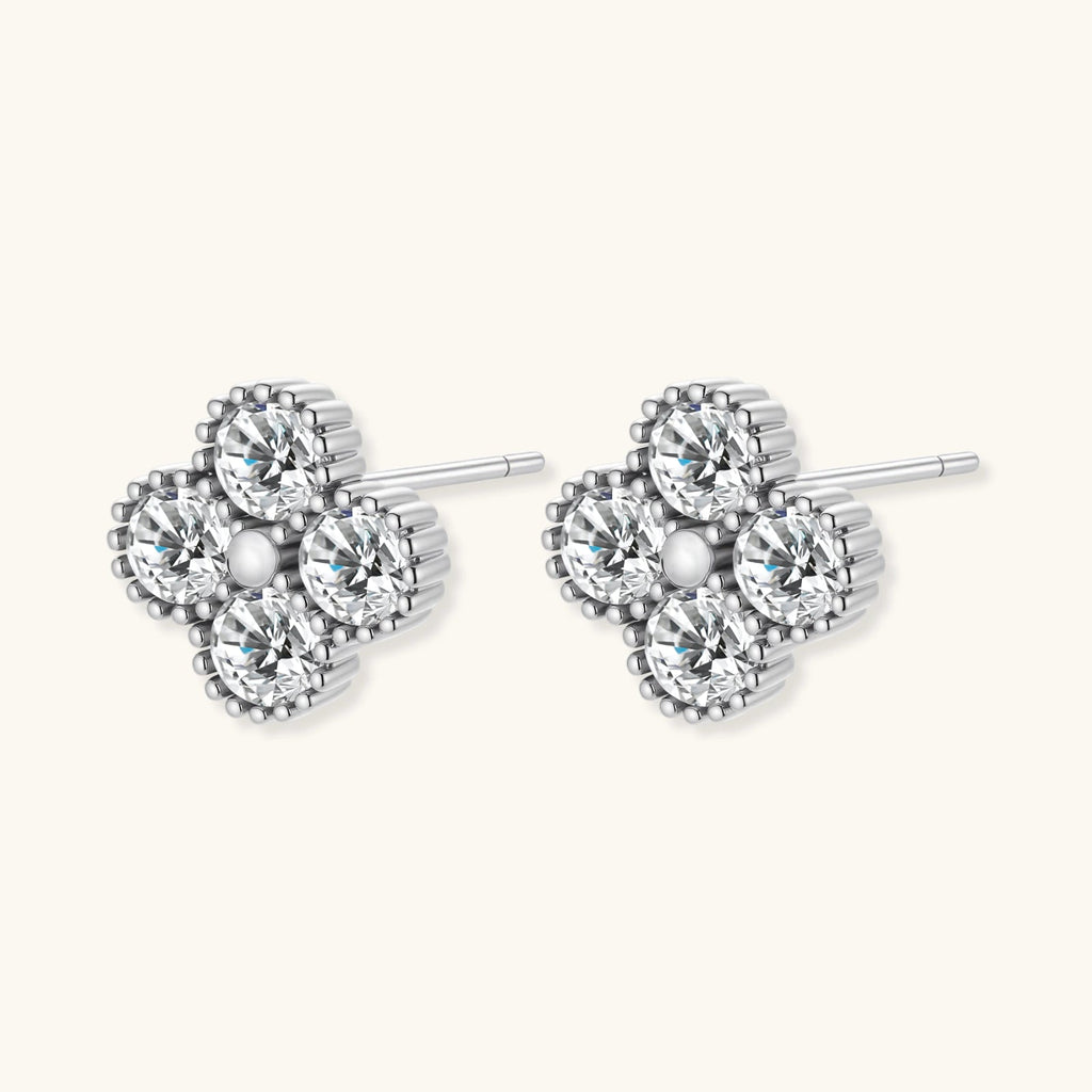 Anointed Garments platinum-plated sterling silver quatrefoil stud earrings featuring brilliant VVS1 moissanite stones.